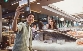 Couple visits the Sydney Fish Markets in Glebe