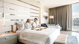 Couple in hotel room at Crown Sydney