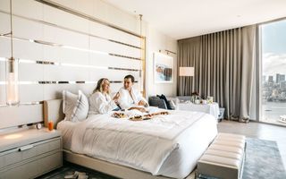 Couple in hotel room at Crown Sydney