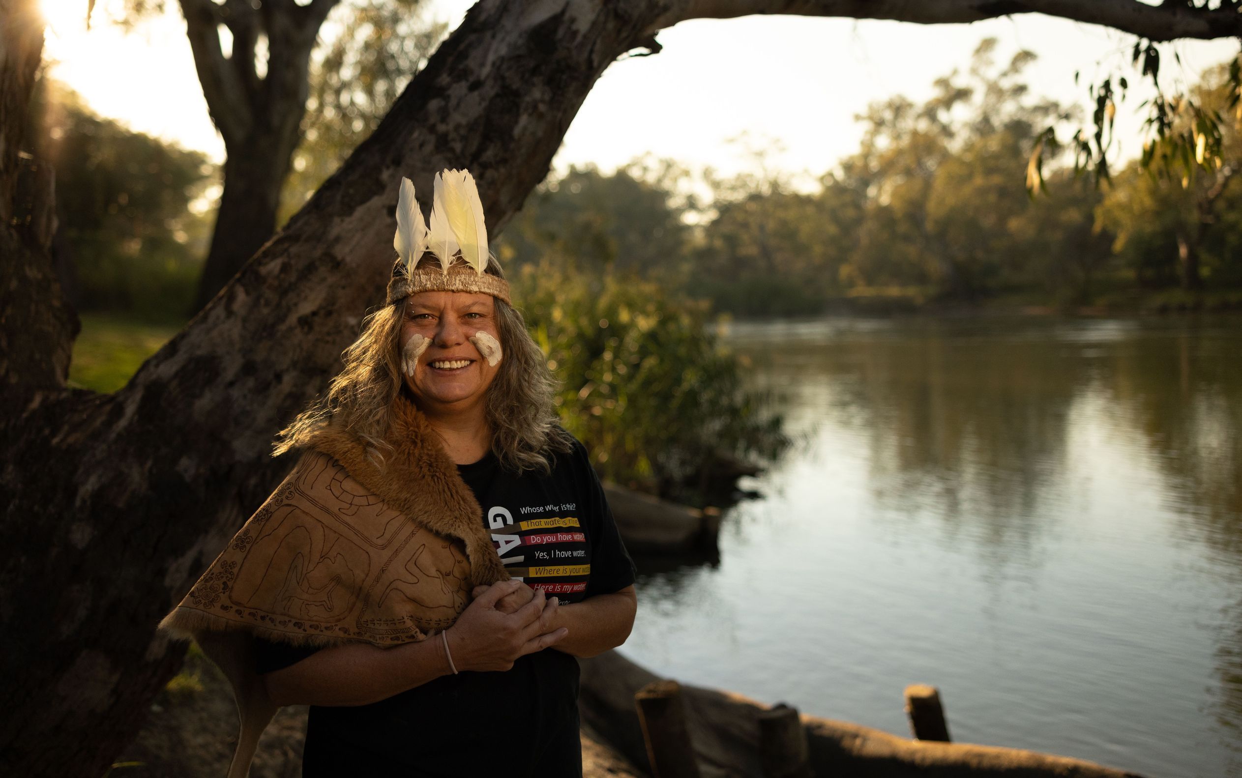 Host Ruth Davys in traditional dress for Wiradjuri Storytellers Sculpture Trail Tours by the Murray River.