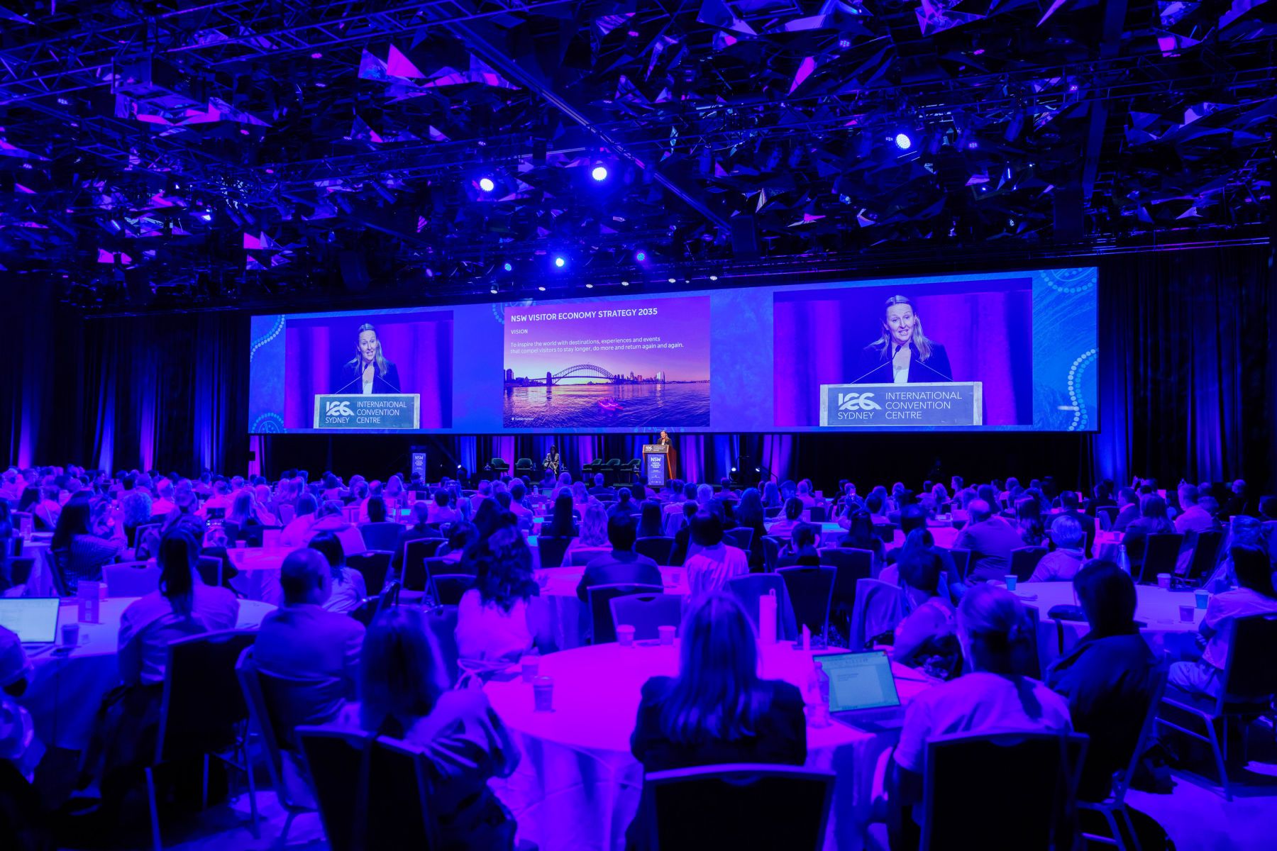 Destination NSW CEO gives presentation at forum.