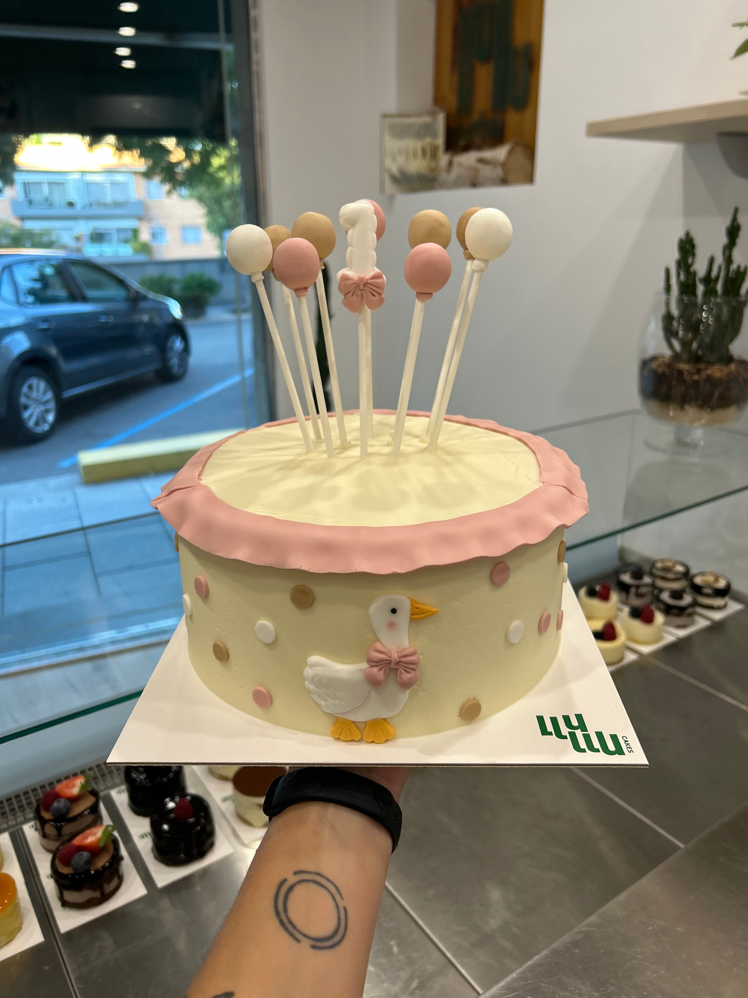 Pastel rosa fino 1 año primer año patito globos