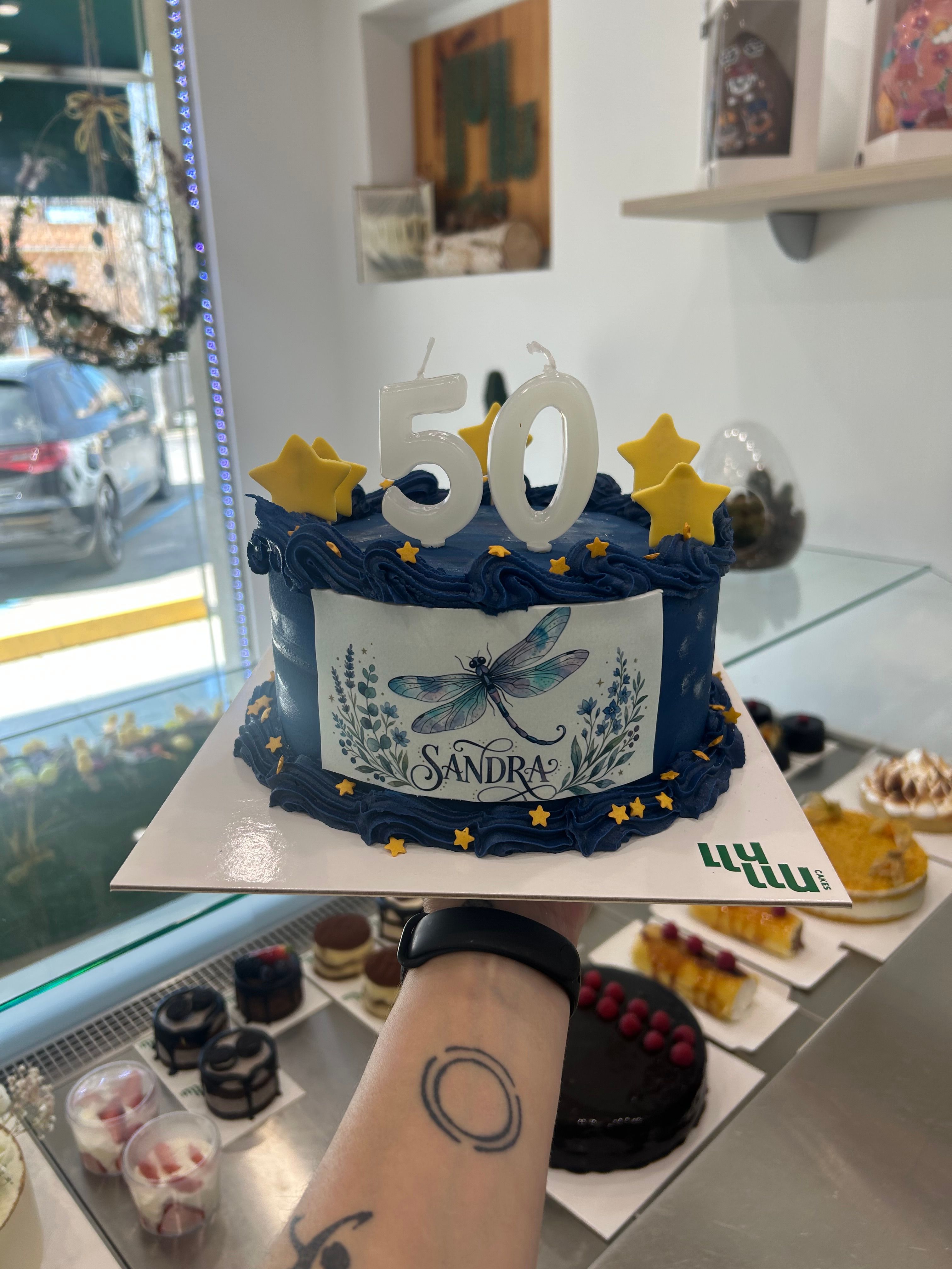Pastel 50 años personalizado azul estrellas