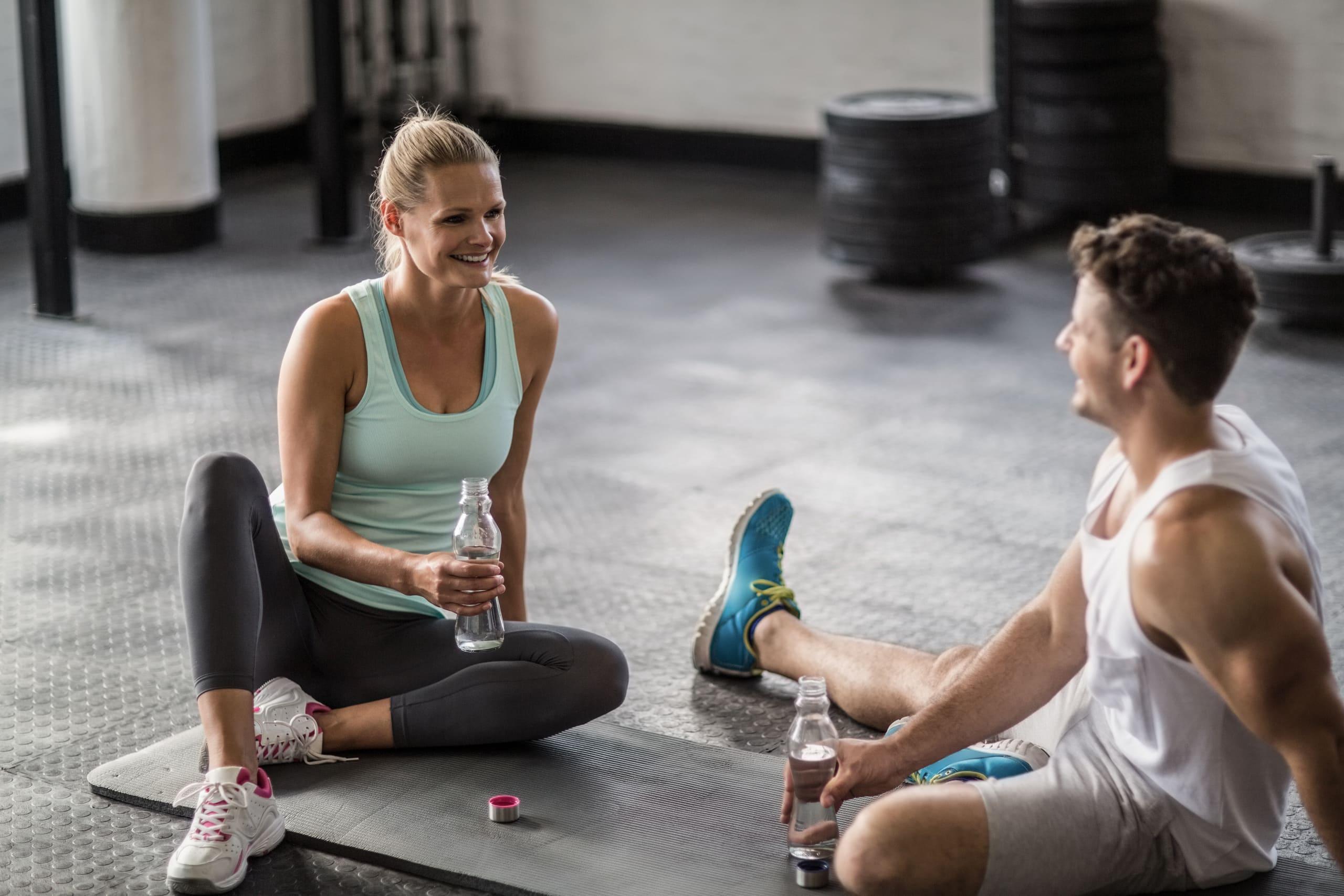 woman training with personal trainer