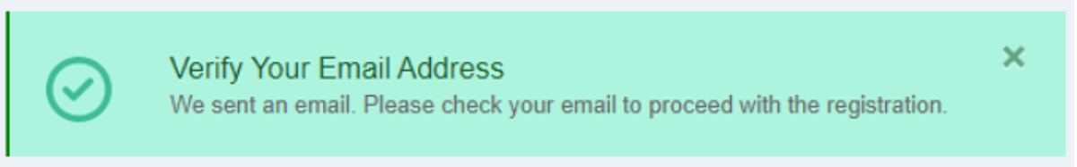 Pop up message with the text "Verify your Email Address. We sent an Email. Please check your email to proceed with the registration."