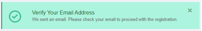 Pop up message with the text "Verify your Email Address. We sent an Email. Please check your email to proceed with the registration."
