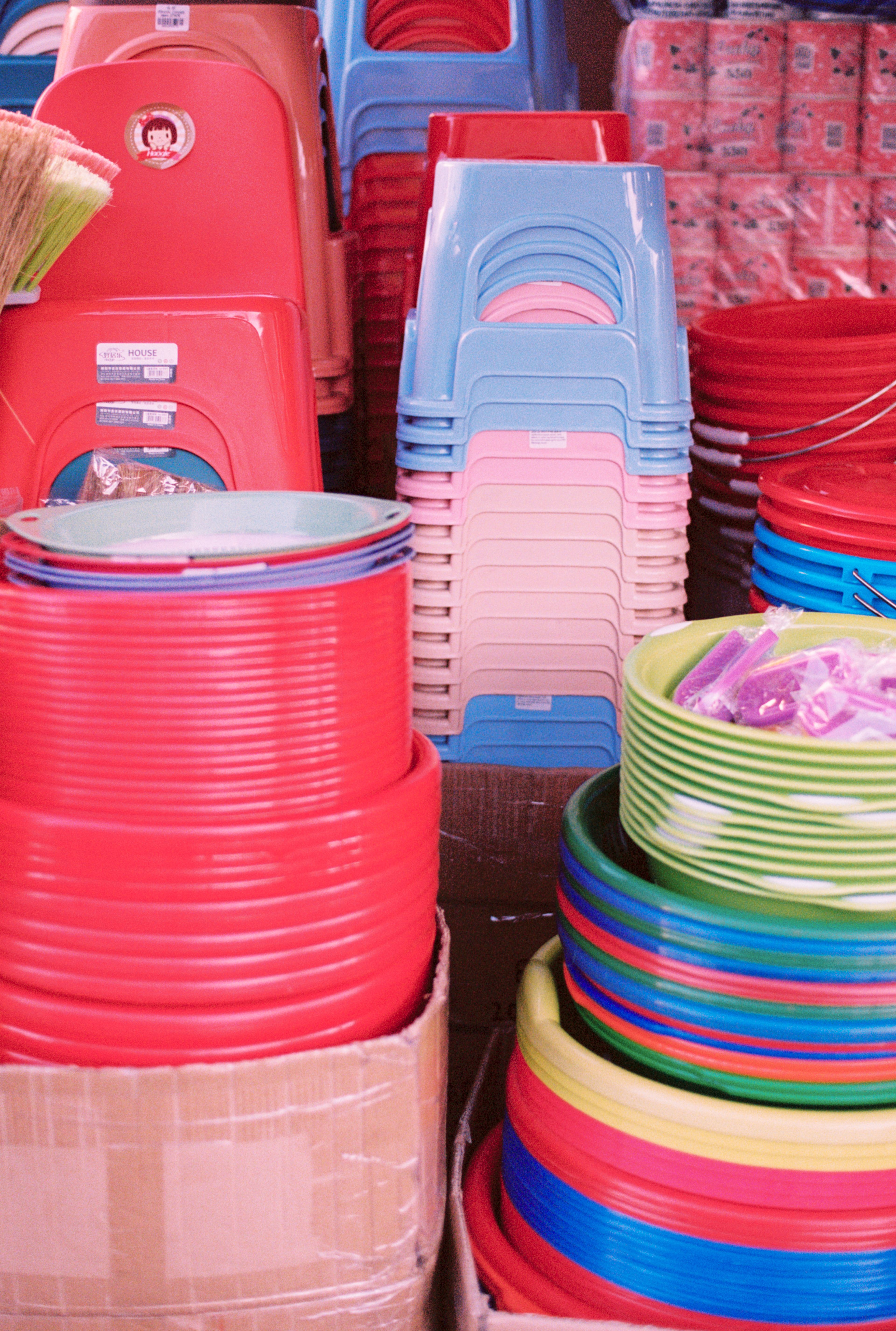 PLASTIC STOOLS STACKED IN CHINATOWN LOS ANGELES, 