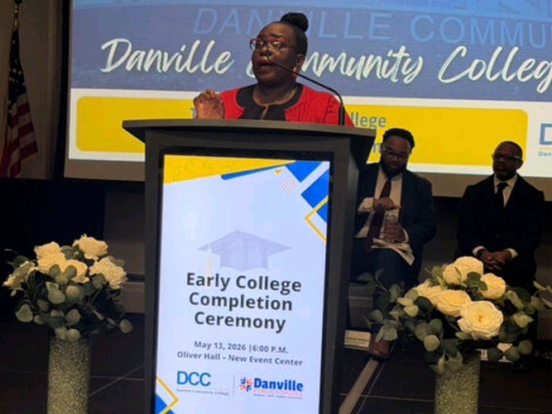 Dr. Takiwi speaking at the Danville Community College Early College Completion Ceremony