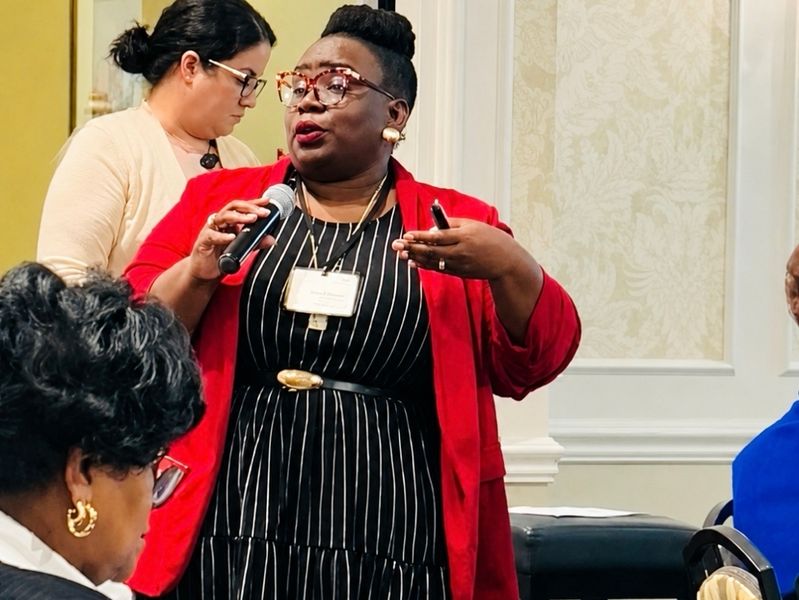 Dr. Takiwi presenting at a leadership session