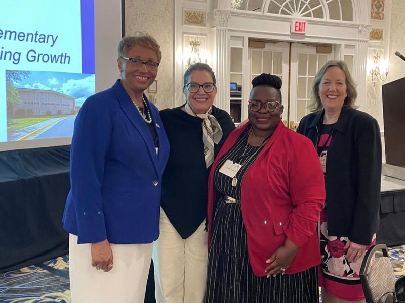 Dr. Takiwi with fellow education leaders at a conference