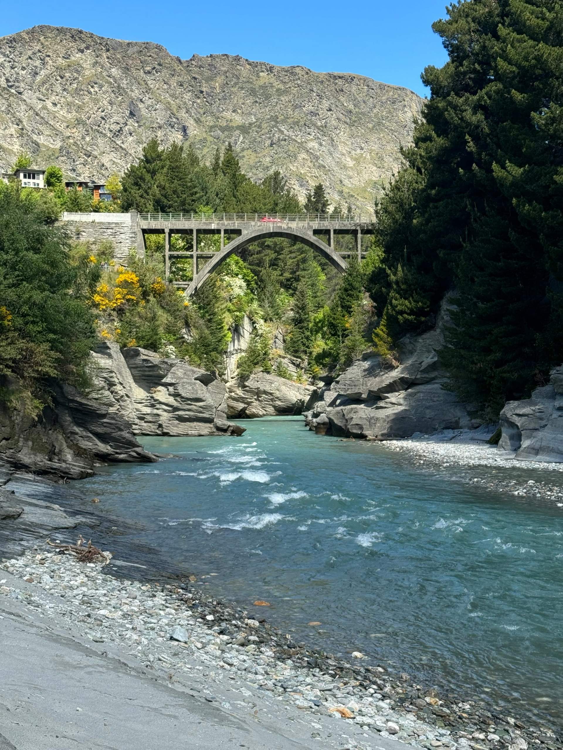 Historic Edith Cavell Bridge spanning the turquoise Shotover River near Queenstown