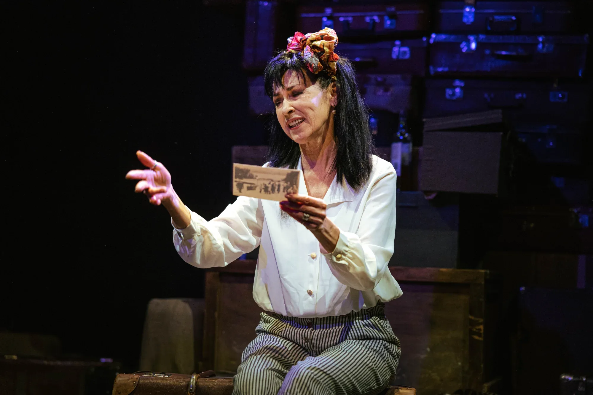 She reads from a piece of paper.