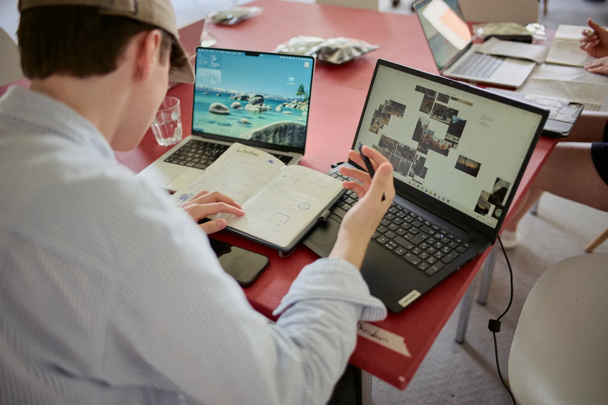 Working with images on a laptop during a workshop.