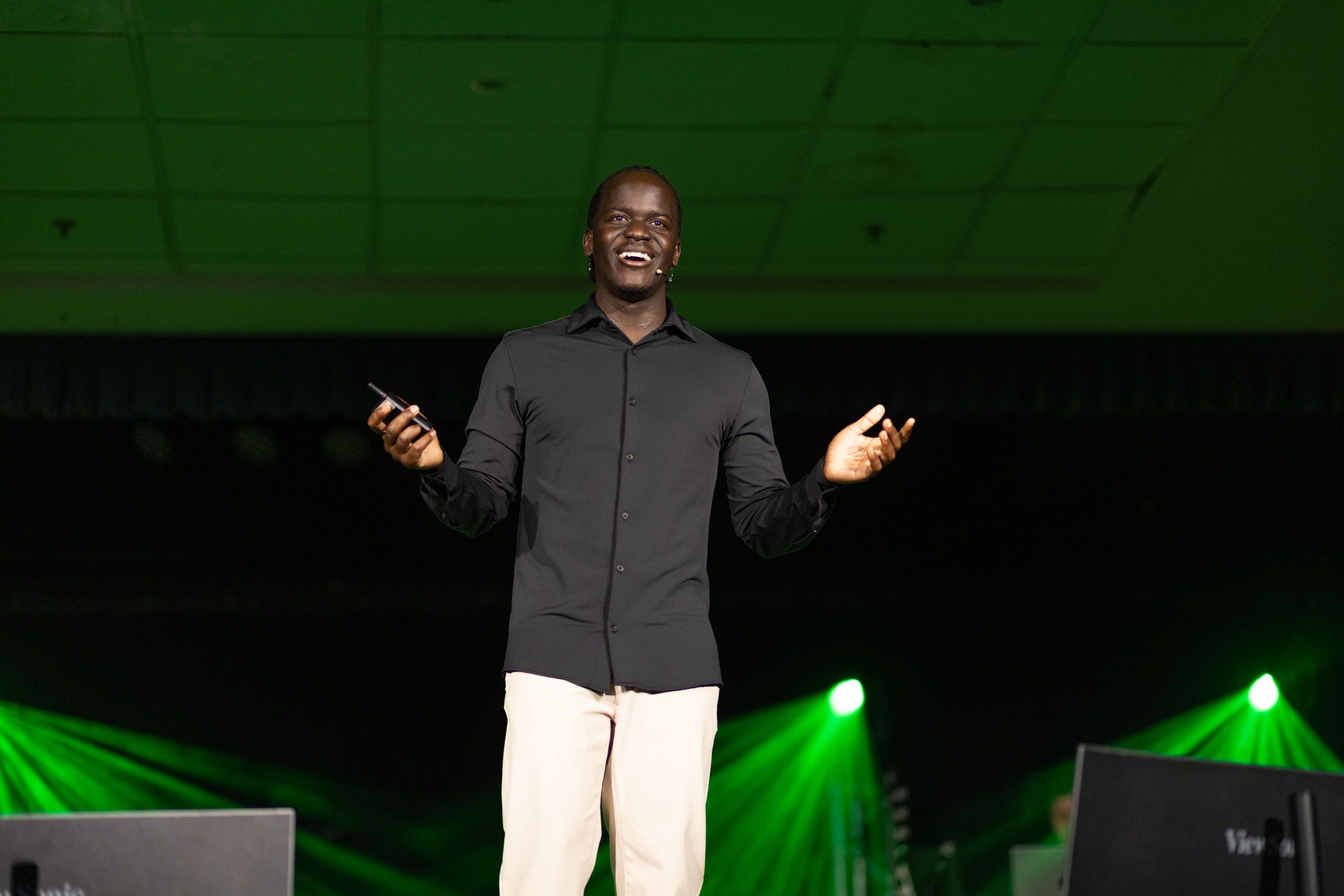 Duku Forè  wearing a hat with a clover on it