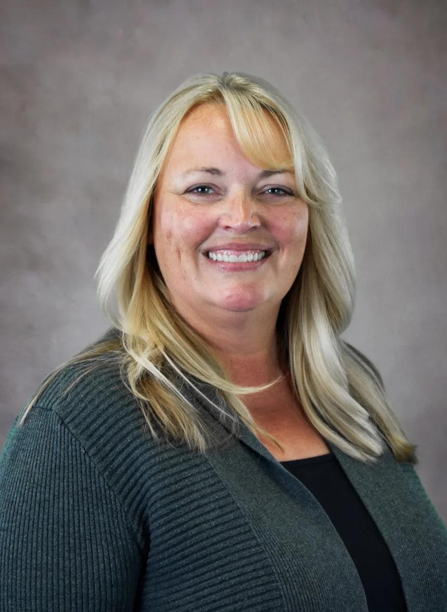 Portrait of Lynnette, Office Manager at Aver Sign Company