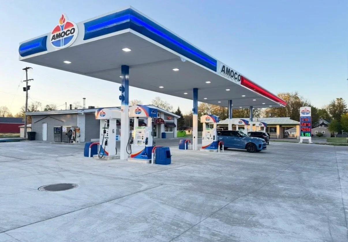 Amoco canopy with blue and red fascia over the pump islands