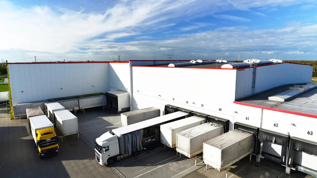 trucks loading nearby warehouse