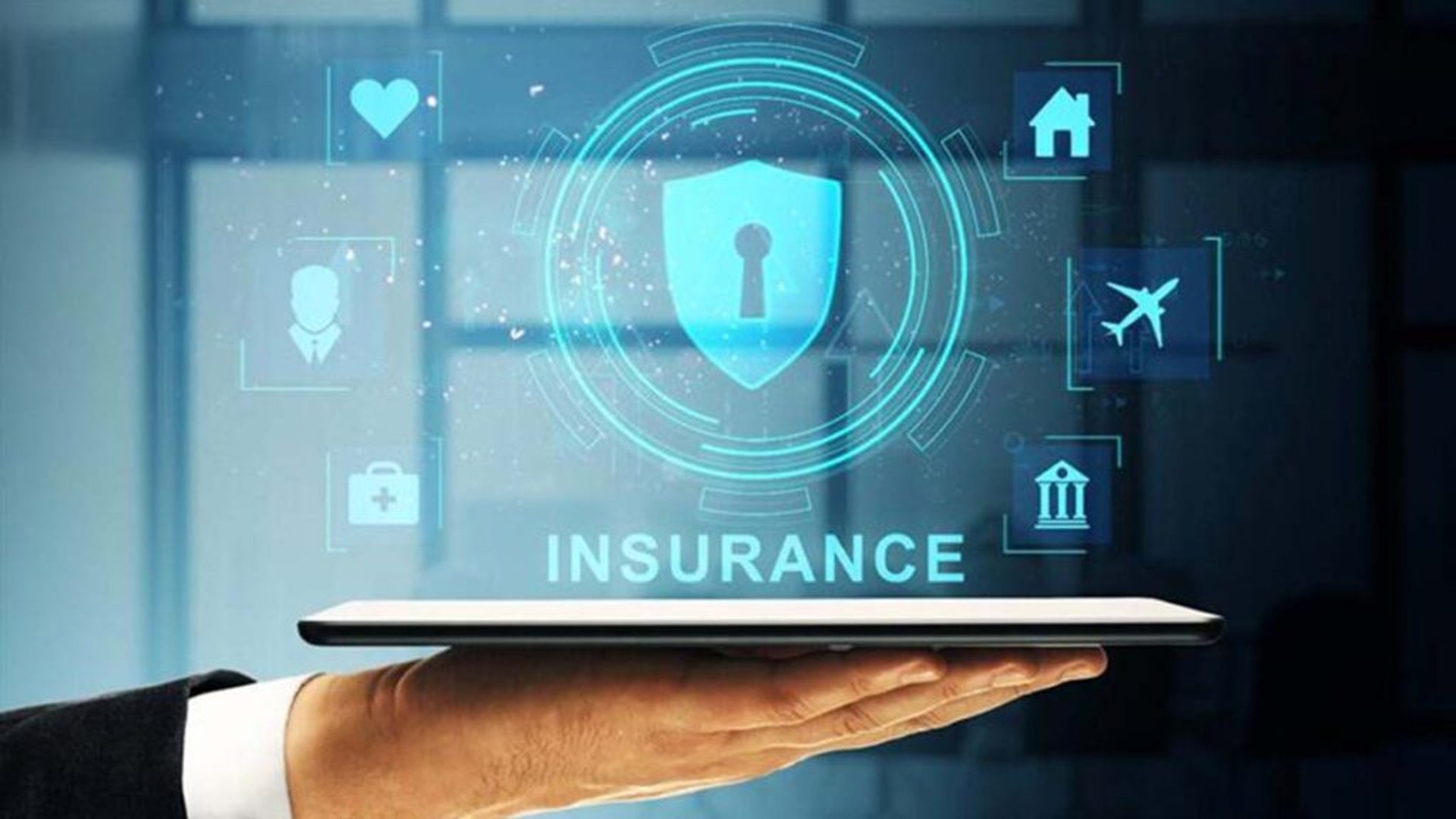 Hand holding a tablet with an insurance icon and category icons overlay