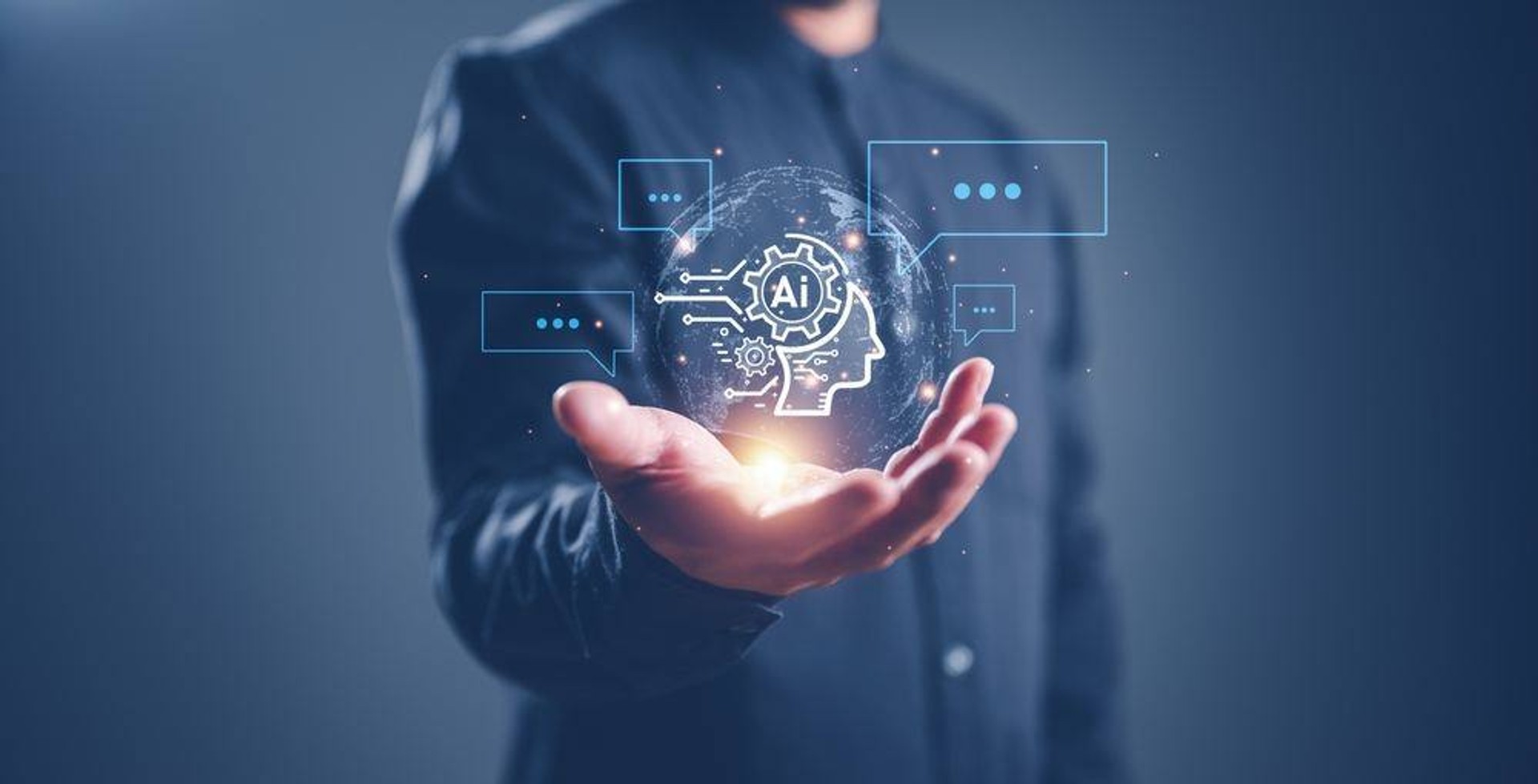 Businessman holding a glowing AI hologram with chat bubble icons
