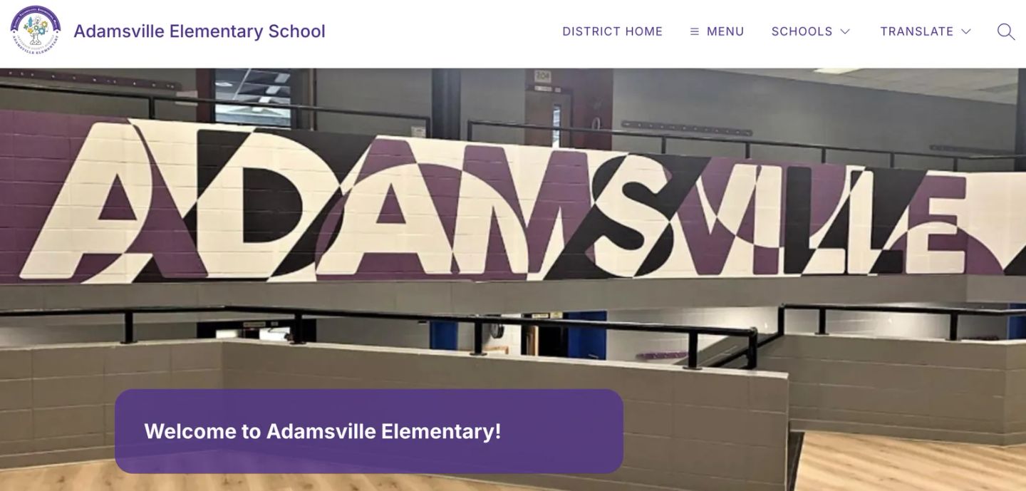 The real Adamsville Elementary School website on its official district site, with a “Welcome to Adamsville Elementary!” banner