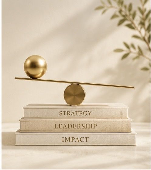 A gold balance beam with a sphere counterpoised on a fulcrum atop stacked books labelled Strategy, Leadership and Impact — the Mentoring Program.