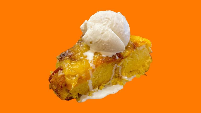 'Ohana bread pudding topped with a scoop of ice cream