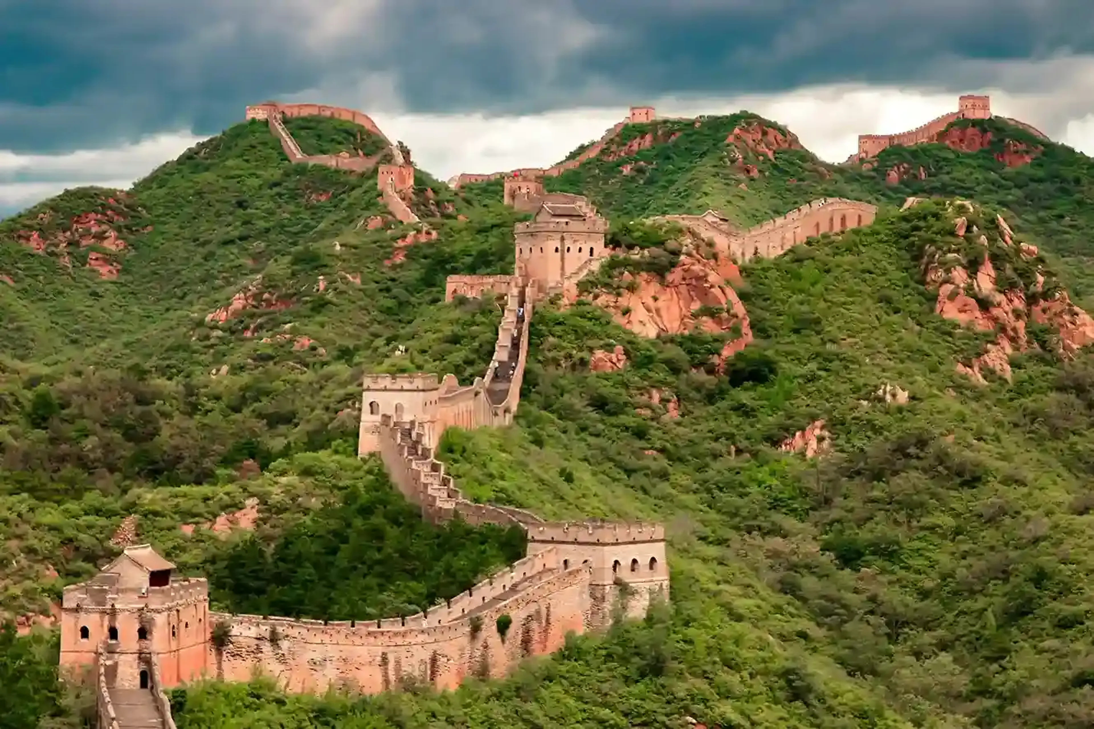 Tourists exploring historic landmarks in China, highlighting cultural heritage and iconic attractions