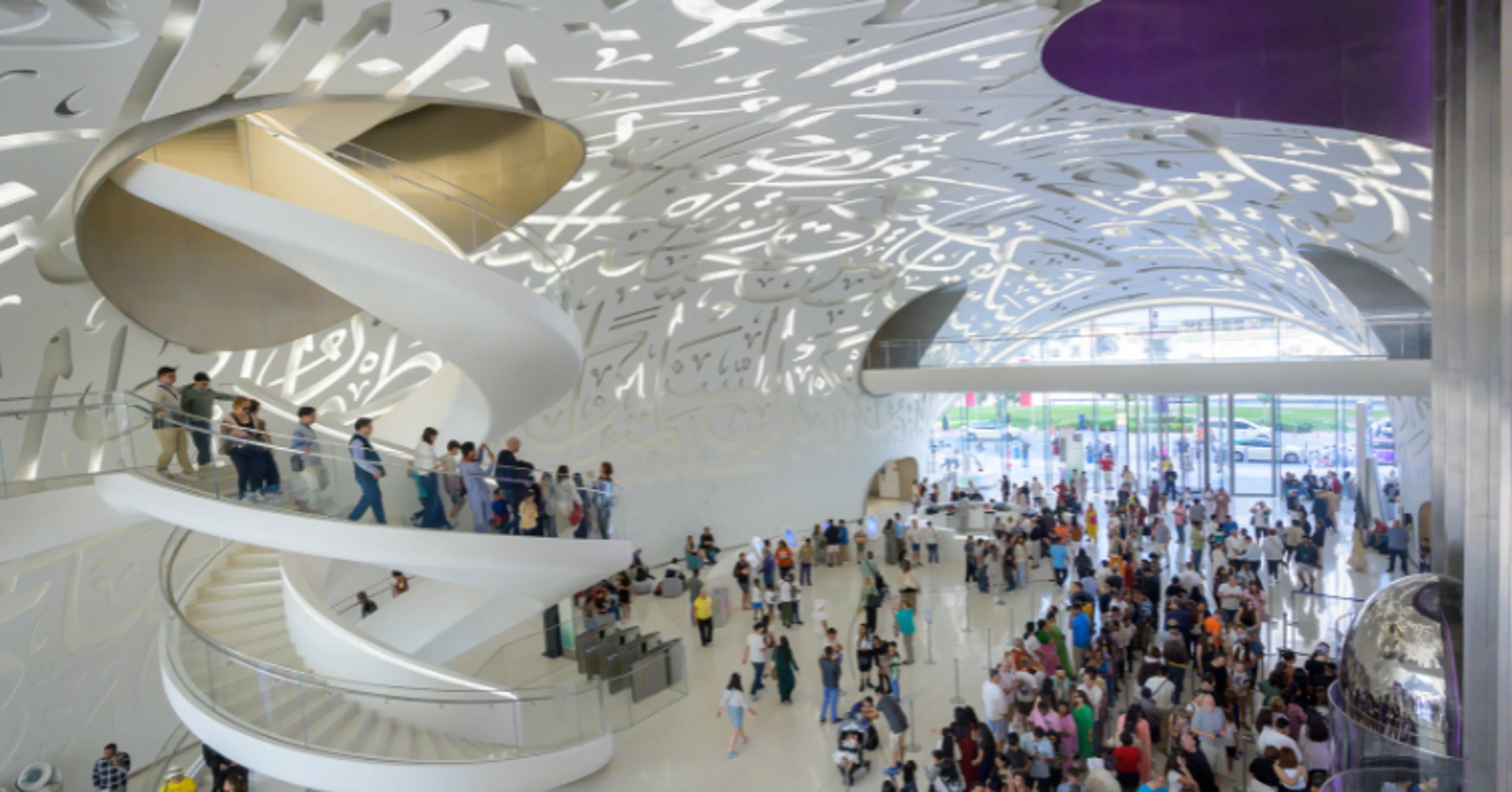 Museum of the Future's futuristic curved facade in Dubai with Palm Jumeirah coastline in the background