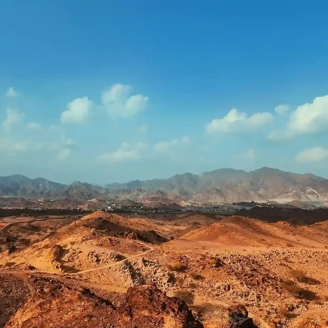 Hatta mountains landscape with kayaking lake and rugged terrain