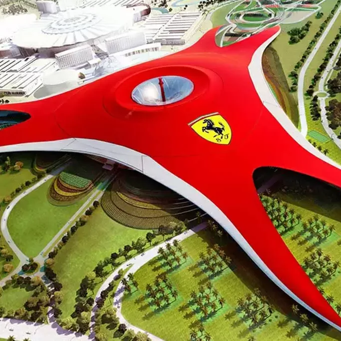 Ferrari World Abu Dhabi theme park with red roof structure and roller coasters