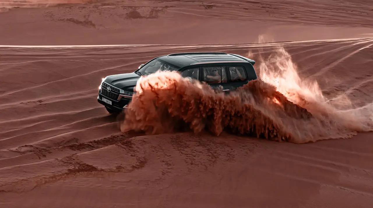 Dubai desert safari with dune bashing and camel rides in Arabian desert