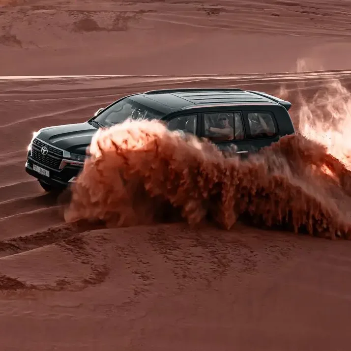 Dubai desert safari with dune bashing and camel rides in Arabian desert