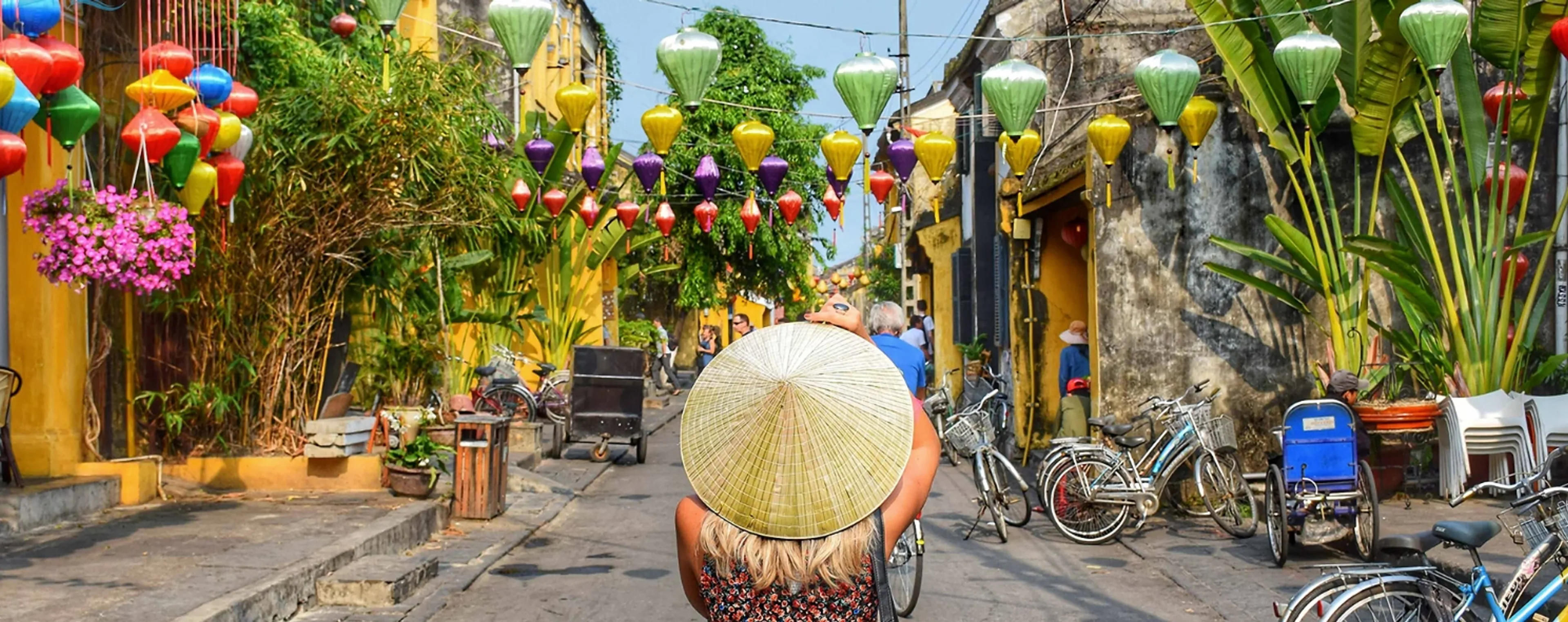 Colorful lanterns strung above Hoi An's ancient town streets