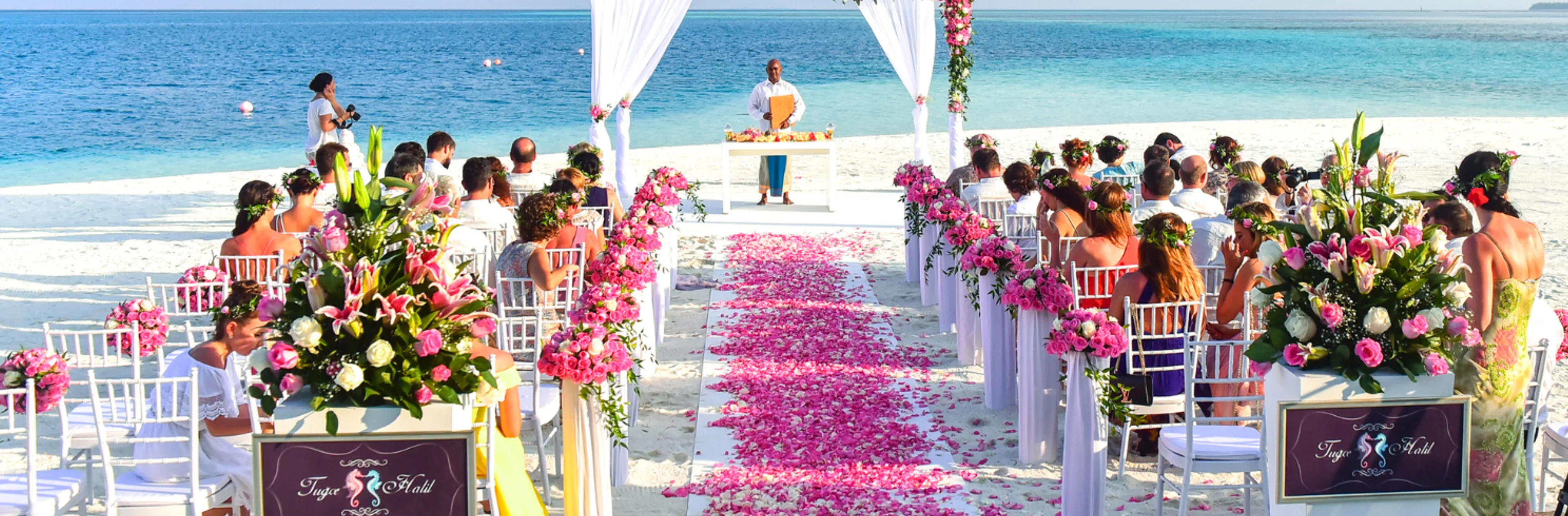 Destination wedding ceremony setup on a Dubai beach