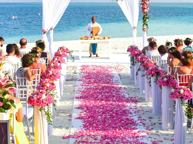 Destination wedding ceremony setup on a Dubai beach