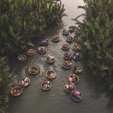 Basket boat ride through coconut jungle waterways in Hoi An