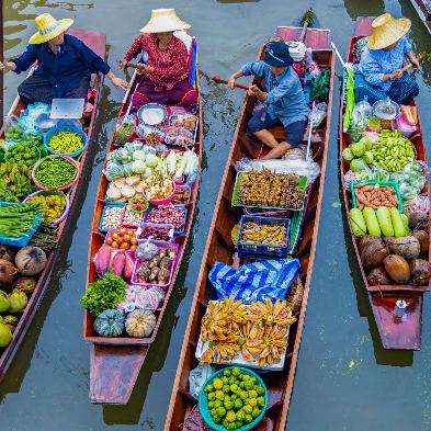 Damnoen Saduak Floating Market with wooden boats near Bangkok