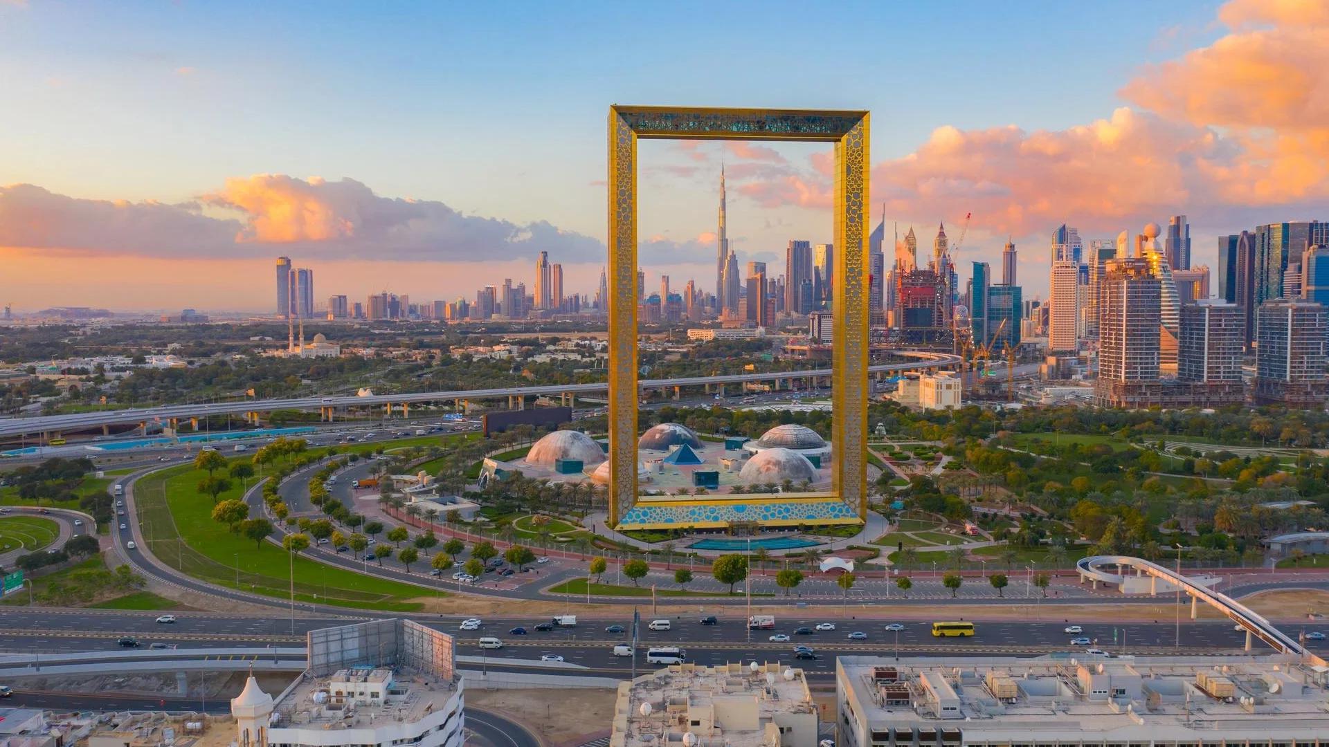 Dubai Frame at sunset, framing the downtown skyline.
