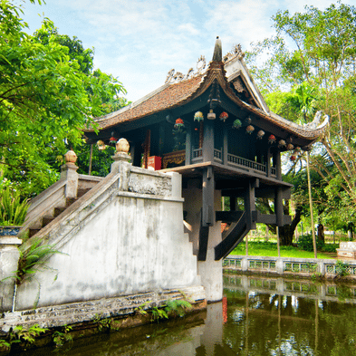 One Pillar Pagoda in Hanoi surrounded by greenery and reflective water