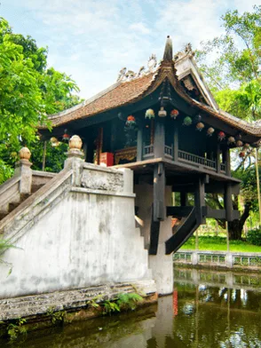 One Pillar Pagoda in Hanoi surrounded by greenery and reflective water