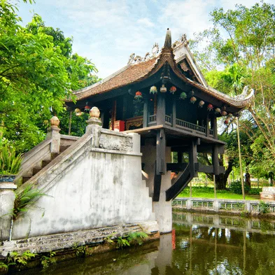 One Pillar Pagoda in Hanoi surrounded by greenery and reflective water