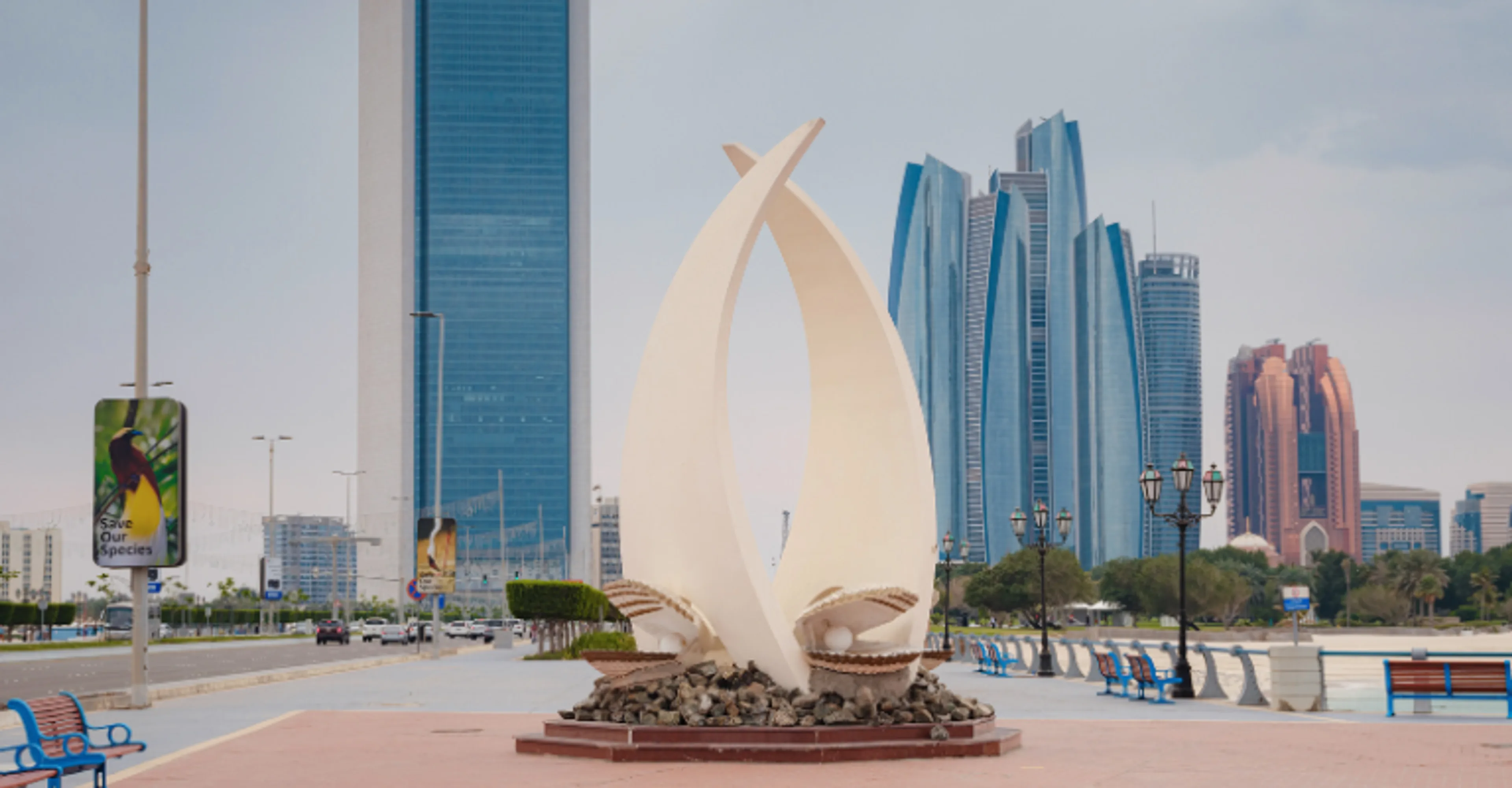 Corniche sculpture with Etihad Towers in Abu Dhabi