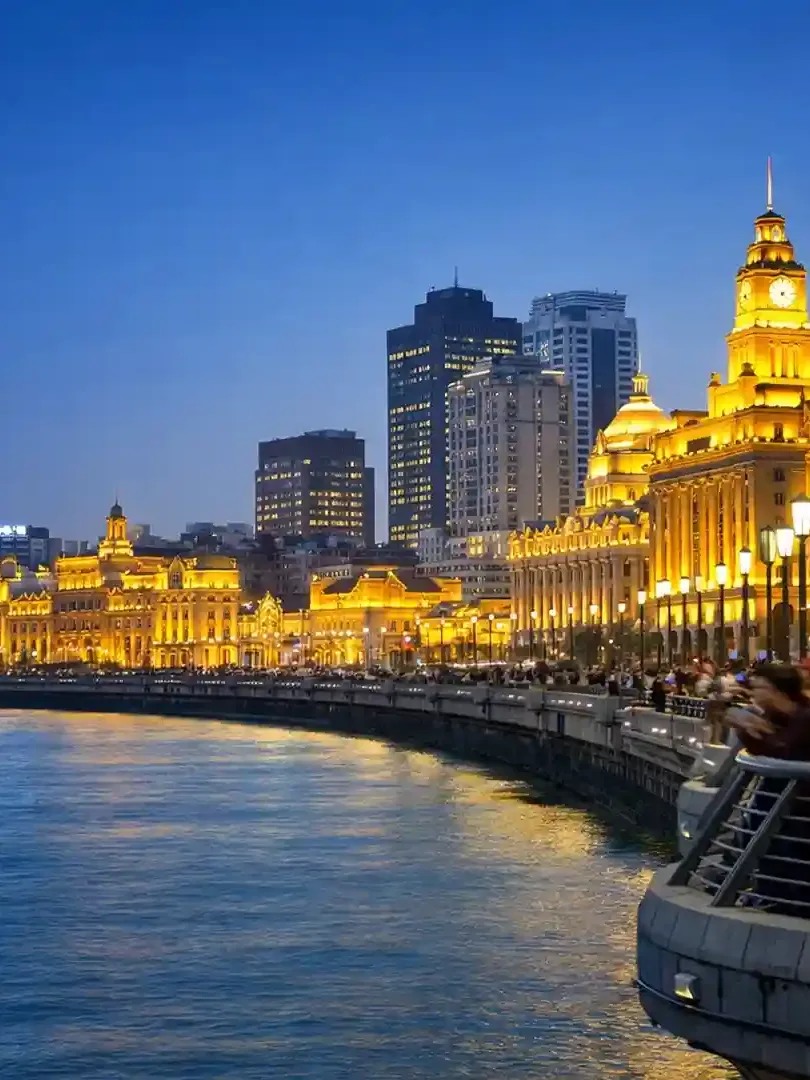 The Bund waterfront in Shanghai with historic colonial buildings along Huangpu River skyline
