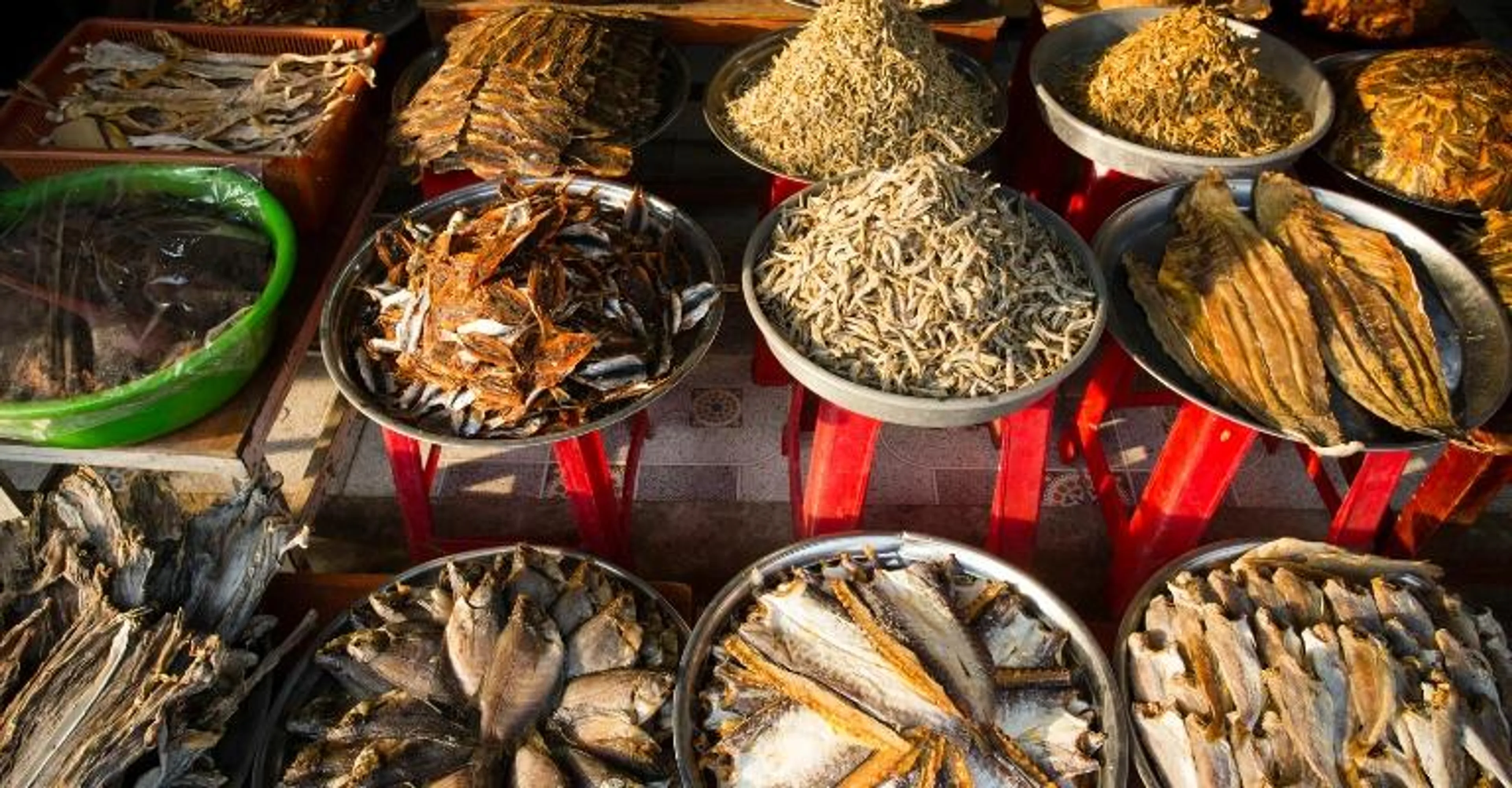Trays of dried fish and seafood for sale at Duong Dong Market