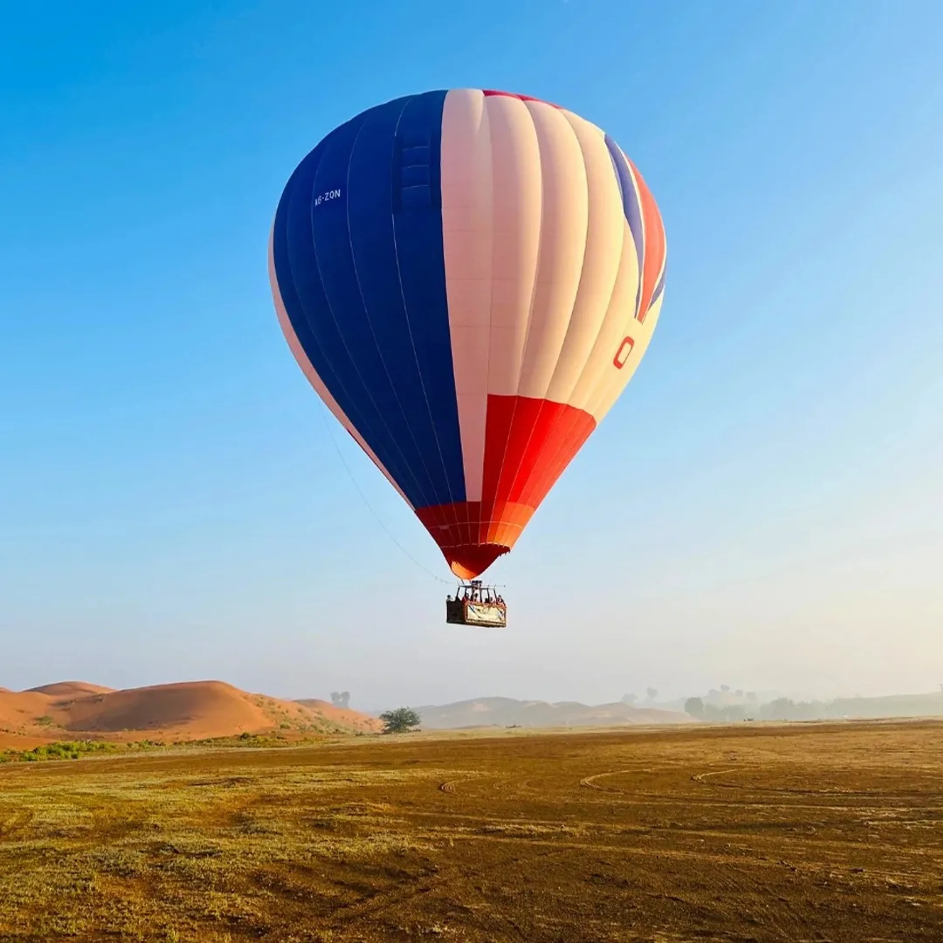 Ras Al Khaimah desert landscape with sand dunes and off-road adventure activities