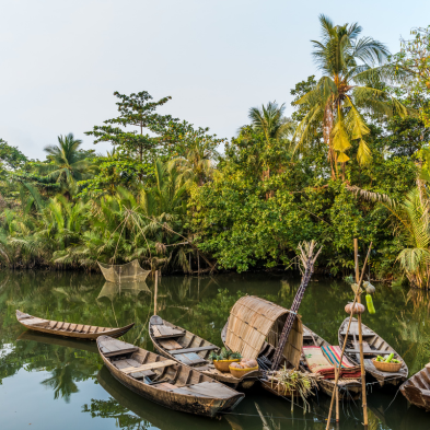 Mekong Delta boat tour with floating villages and tropical river landscapes