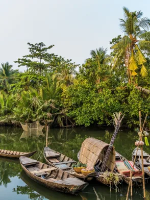 Mekong Delta boat tour with floating villages and tropical river landscapes