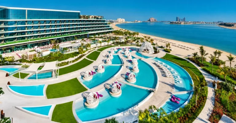Luxury beachfront resort on Palm Jumeirah with pools and Arabian Gulf views