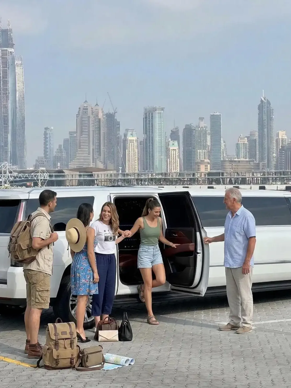 Luxury limousine sightseeing tour passing Dubai city landmarks