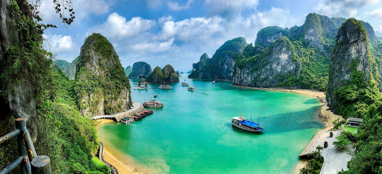Scenic Vietnam travel destination featuring tropical beaches, mountains, cultural landmarks, and vibrant city experiences
